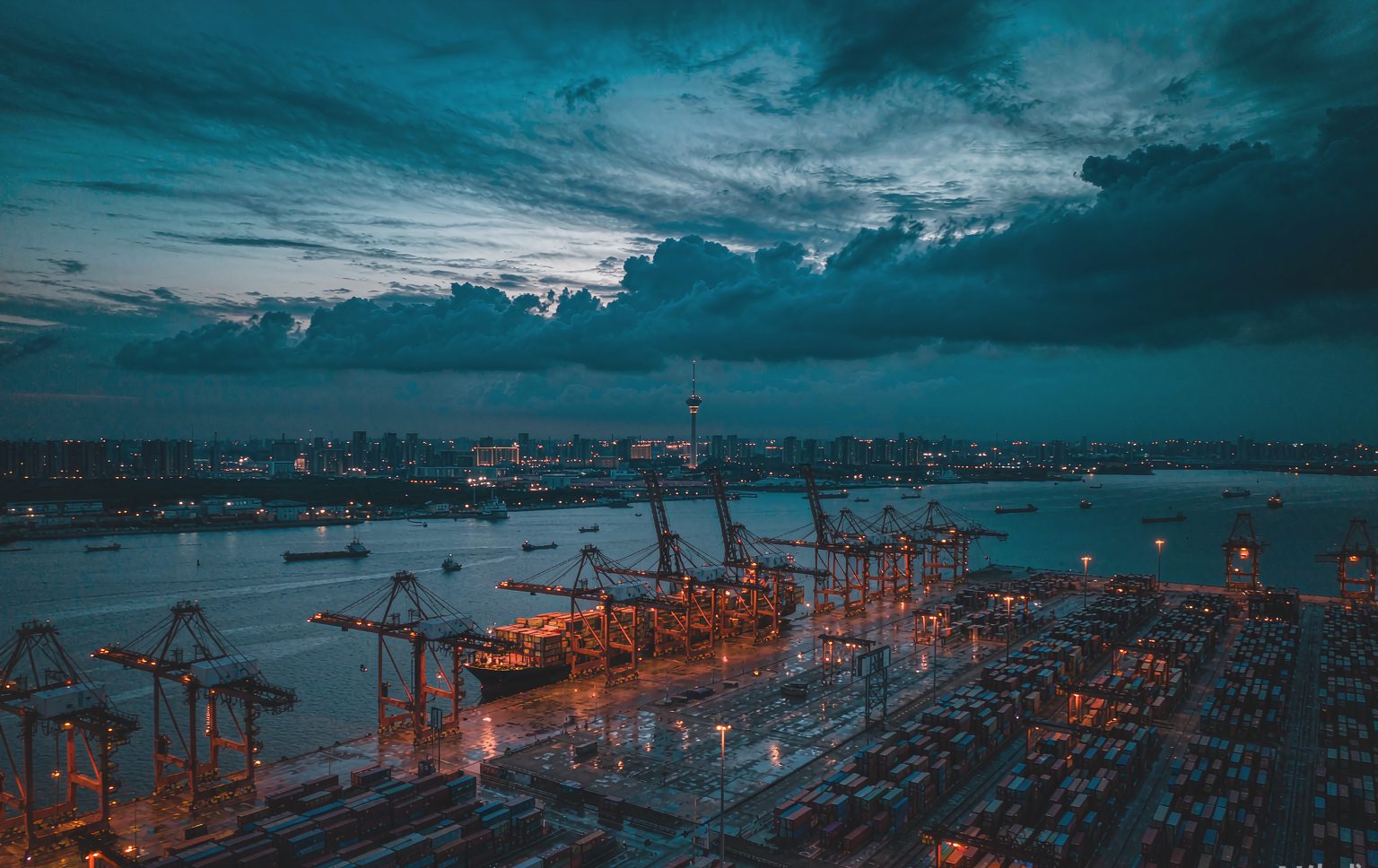Container terminal at dusk — international ocean freight